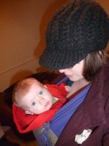 Baby craning backwards